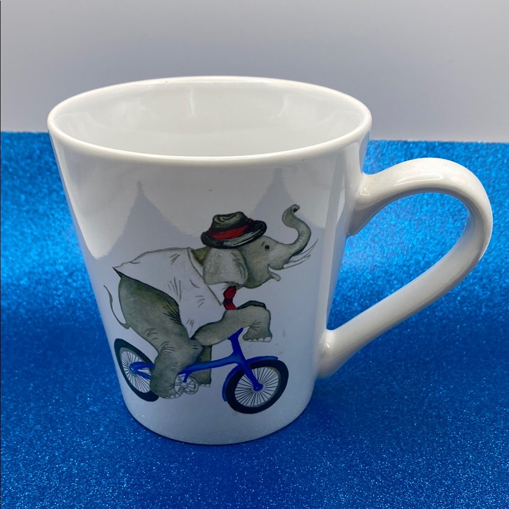 SD Graphics Charming Elephant Riding A Blue Bicycle Mug